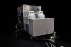 Southern Pride MLR-150 Mobile trailer-mounted gas rotisserie smoker, rear three-quarter view on the trailer