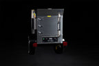 Southern Pride MLR-150 Mobile trailer-mounted gas rotisserie smoker, right side view on the trailer