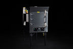 Southern Pride MLR-150 commercial gas rotisserie smoker, angled view showing the firebox side and control panel