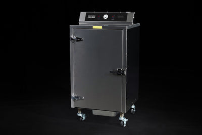 Southern Pride SC-100 commercial electric smoker, front three-quarter view on casters
