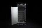 Southern Pride SC-300 commercial electric smoker with the door open showing stationary product racks