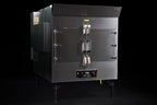 Southern Pride SP-700 commercial gas rotisserie smoker, angled view showing firebox side and control panel