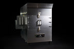 Southern Pride SPK-1400 commercial gas rotisserie smoker, angled view showing the firebox side and control panel