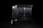 Southern Pride SPK-500 Mobile trailer-mounted gas rotisserie smoker, side profile on the trailer