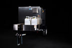 Southern Pride SPK-500 Mobile trailer-mounted gas rotisserie smoker, angled view of cabinet and trailer
