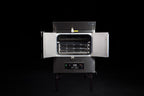 Southern Pride SPX-300 commercial gas rotisserie smoker with doors open showing the rotisserie rack system