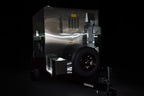 Southern Pride SP-700 Mobile trailer-mounted gas rotisserie smoker, rear three-quarter view on the trailer