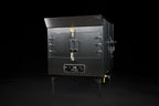 Southern Pride SPK-500 commercial gas rotisserie smoker, front three-quarter view on legs