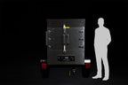 Southern Pride SPX-300 Mobile trailer-mounted gas rotisserie smoker shown to scale beside a person
