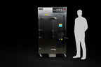 Southern Pride SRG-400 commercial gas smoker shown to scale beside a person